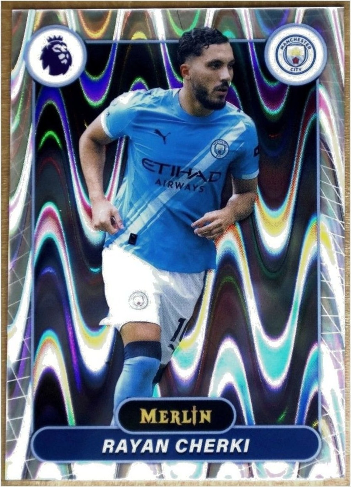 Topps Merlin Premier League 2025-26 #124 Rayan Cherki (Manchester City) — Refractor holográfico (patrón de ondas) — no base